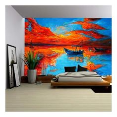 a bedroom with a painting on the wall