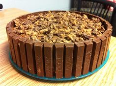 a chocolate cake sitting on top of a blue plate