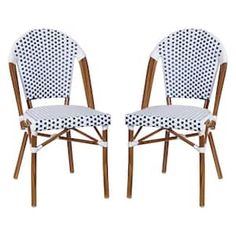 two white and brown chairs sitting next to each other