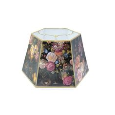 a lamp shade with flowers painted on it