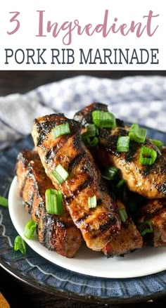 grilled pork ribs with green onions on a plate