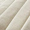 closeup of white fabric textured with natural linens for curtains and upholstering