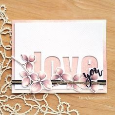 a close up of a card with flowers on it