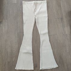 Topshop Cream White Ribbed Stretchy Flared Pants. Us Size 14. Brand New With Tags. Ribbed Texture. Elastic Waist With Drawstring. Stretchy Material. Flared Leg. Great Neutral Color. Goes Great With Anything. Spring Ribbed Beige Bottoms, Spring Beige Ribbed Bottoms, Spring Cotton Ribbed Bottoms, Spring Ribbed Cotton Bottoms, Chic Ribbed Cotton Bottoms, Ribbed High Waist Spring Bottoms, Spring High Waist Ribbed Bottoms, Cream Stretch Long Pants, Ribbed High-waist Spring Bottoms