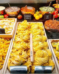 various types of pasta on display in a store