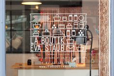 a window with the words la boutette eva staub on it