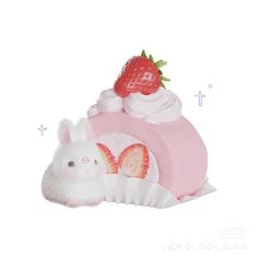 a white rabbit laying on top of a pink cupcake covered in frosting and strawberries