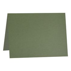 two sheets of green paper on a white background