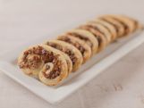 a white plate topped with cookies on top of a table