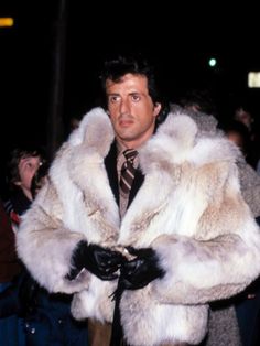 Channel Sylvester Stallone's iconic style with the Sylvester Stallone Movie Stayin Alive Fur Jacket – a bold and timeless piece inspired by the golden era of cinema. Elevate your look with this fur jacket that echoes the classic glamour of the movies. 🎬🕶️🧥 #SylvesterStalloneStyle #StayinAliveJacket #MovieIconFashion #FurJacketGlamour #TimelessElegance #HollywoodInspired #winteroutfits #outfitideas #style #outfit #mensstyle #menscoatsandjacket #mensoutfitbyoccasions #mensactivewear #SylvesterStalloneFashion #StayinAliveFurJacket #CinemaStyle #MovieIconChic #FurJacketGlam #TimelessGlamour #ClassicHollywood #CelebrityFashion #IconicStyle #FashionStatement #GlamorousWardrobe #MovieInspiredFashion Fur Coat Men, Fur Coat Outfit, Mens Fur Coat, Fox Fur Jacket, Mens Fur, Sylvester Stallone, Vintage Fur, Coat Outfits, Fur Fashion