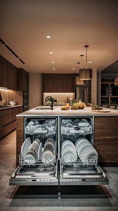 an open dishwasher in the middle of a kitchen with lots of counter space