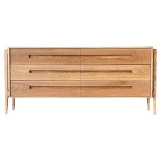 the sideboard is made from wood and has three drawers