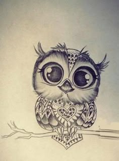 an owl sitting on top of a branch with big eyes and a lace headband