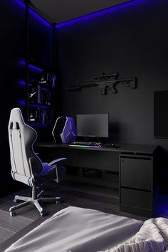 a white chair sitting in front of a computer desk