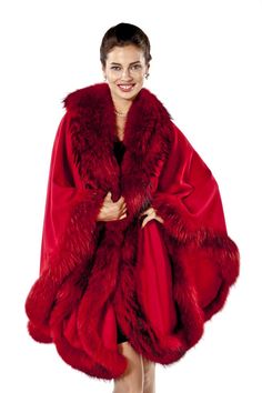 Ferrari Red Cashmere Cape- Finn Raccoon TrimCashmere Cape Fabric Content: 100% Cashmere . Fur Content : Red Dyed Finnish Raccoon. Fur Origin: Finland. Length: 34" from under fur neckline to hemline at center back. Hook and Eye closure. Also available in 12 fashion forward colors. Matching headband available.$995.00http://www.madisonavenuemalls.com/shop/cashmere/cashmere-capes-wraps-stoles/ferrari-red-cashmere-cape-finn-raccoon-trim/ Fur Trimmed Coat, Mink Coats, Cape For Women, Paint The Town Red, Ferrari Red, Cashmere Cape, Red Fur, Fur Jackets, Women Suits