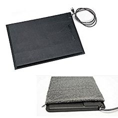 a laptop computer sitting on top of a table next to a mouse pad and cord