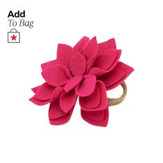 a pink flower on a gold ring with the words add to bag written below it