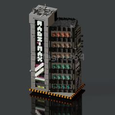 a tall building made out of legos on top of a reflective surface with the words rad brick written across it