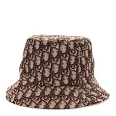 This is an authentic CHRISTIAN DIOR Oblique Reversible Teddy-D Brim Bucket Hat in Beige. This ultra-chic bucket hat is crafted of beige nylon fabric. Dior Oblique, Nylon Fabric, Christian Dior, Bucket Hat, Dior, Hats, Fabric