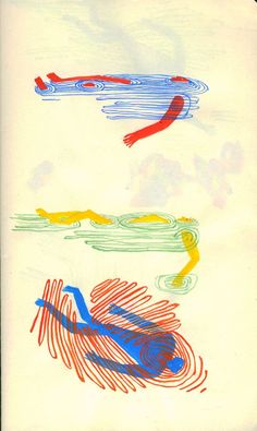 an old book with colorful drawings on the pages and in front of it is a drawing of a bird