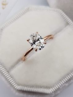 an engagement ring with a diamond in it