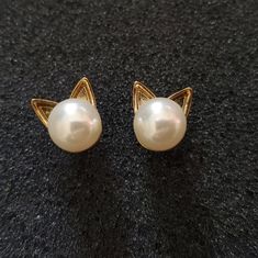 New Kitty Ear Pearl Stud Earrings. Goldtone Zinc Alloy. Tags: Cats, Kittens, Kitty, Cat Mom, Cat Dad, Cat Lover, Pretty, Simple, Ornate, Classic, Classy, Nwt Skeleton Earrings, Cat Earrings Studs, Sleeper Earrings, Lapis Lazuli Earrings, Mom Cat, Face Earrings, Kate Spade Earrings, Sterling Silver Drop Earrings, Opal Studs