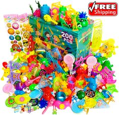 a box filled with lots of toys and stickers on top of a white background