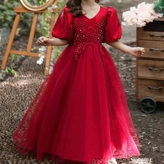 Red Formal Princess Dress This Stunning Elegant Formal Dress Is Perfect For A Pageant, Party, Flower Girl In A Wedding For That Special 5-6 Year Old Little Girl. Please Note Measurements Prior To Buying. The Lovely Gown Is Adorned With Rhinestones And Beads. Puffed Sleeves Frame A Fitted Bodice Cascading Into Layers Of Tulle And Satin. Measurements From Manufacture Bust 25.2" Length 35.1" Recommended Height 3.6" - 3.10" Tags For Searching: Formal. Special Occasion Dresses. Birthday Party Dresses Dresses Fluffy, Girl Silk Dress, Formal Christmas Dress, Dress Red Long, Elegant Formal Dress, Red Flower Girl Dresses, Tulle Skirt Dress, Birthday Party Dresses, Outdoor Dress