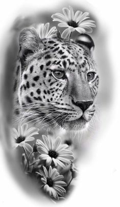 a black and white photo of a leopard with daisies in front of it's face