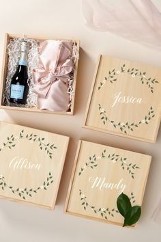 three wooden boxes with personalized items in them