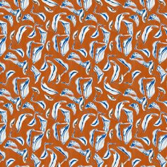 an orange background with blue and white swirls