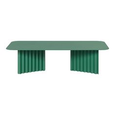 a green table with two long pleated legs