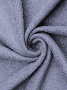 a close up shot of a grey fabric