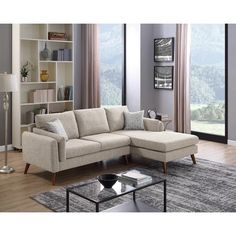 a living room scene with focus on the corner sofa