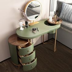 a green desk with drawers and a mirror on the wall next to a couch in a living room