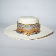 Handmade cowboy hat made with high quality fabrics and trims. ETA can take up to 14 days to delivered due to the fact that each pieces are handmade Cream Brimmed Straw Hat For Rodeo, Cream Western Straw Hat For Rodeo, Western Cream Straw Hat For Rodeo, White Toquilla Straw Hat For Ranch, White Adjustable Panama Hat For Western-themed Events, Handmade Straw Hat For Kentucky Derby And Rodeo, White Western Boater Hat With Curved Brim, Handmade Straw Hat For Rodeo And Kentucky Derby, Artisan Toquilla Straw Hat For Rodeo