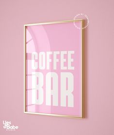 a pink and gold framed poster with the words coffee bar in white letters on it