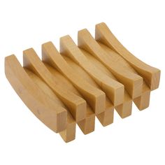 a set of four wooden blocks sitting on top of each other