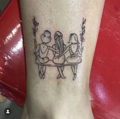 three people sitting on a bench tattoo on the ankle