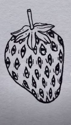 a drawing of a strawberry on white paper