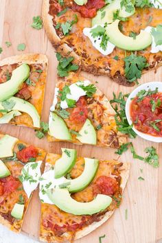 several slices of pizza with avocado and tomato sauce