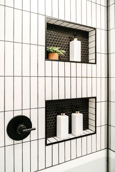 the bathroom is decorated in black and white with hexagonal tiles on the wall