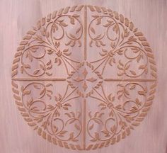 a wooden door with an intricate design on it