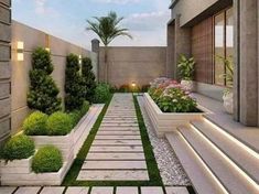 an outdoor garden with steps and plants in the center, surrounded by concrete planters