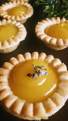 four small pies sitting on top of a table