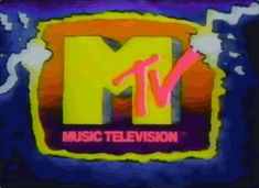 the logo for music television is shown in this artistic photo, which appears to be blurry