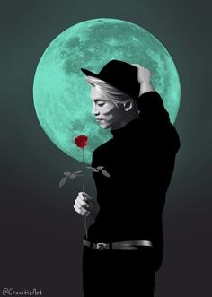 a man holding a rose in front of a full moon