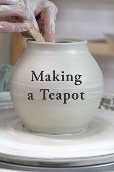 a person is making a teapot out of clay with the words making a teapot on it