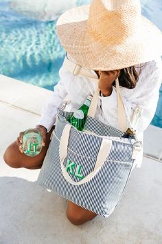 "Keep your goodies cool and fresh while picnicking in style with our Embroidered Monogram Striped Cooler Tote! This cooler tote features a top zip closure and front exterior zip pocket for easy access to all your essentials. The USDA certified insulated lining will keep your snacks and drinks chilled, making it a must-have for any outing. Plus, add a monogram for a personalized touch. Get ready to adventure in stye!<     Details: - 12\" x 18\" x 5.5\" - 12 oz Canvas exterior - Top zip closure wi Summer Cotton Bag For Picnic, Cotton Picnic Bag For Summer, Cotton Summer Picnic Bag, Summer Outdoor Bags With Zipper Closure, Summer Outdoor Bag With Zipper Closure, Casual Bags For Weekend Trips In Spring, Casual Spring Bags For Weekend Trips, Cotton Bags For Weekend Trips In Summer, Cotton Bags For Weekend Trips During Summer