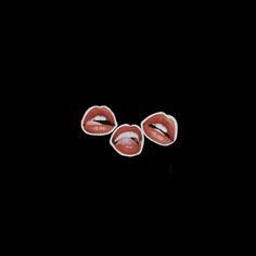 three red lips sticking out of each other on a black background with the word kiss written in it